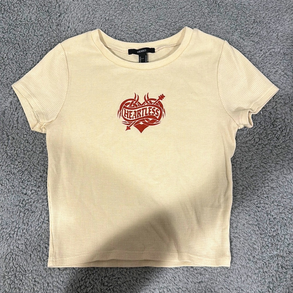 Forever 21 - kinda cropped ( depending on how tall you are “heartless” T-shirt